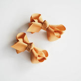 SNUGGLE HUNNY KIDS | Mustard Clip Bow - Small Piggy Tail Pair